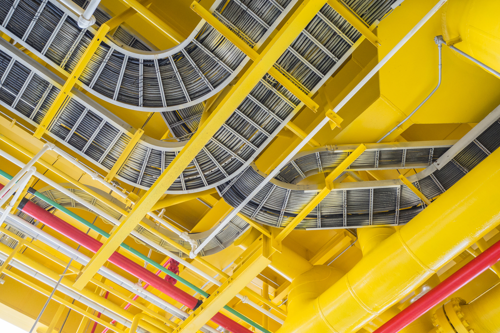 a yellow pipes and a yellow structure